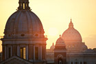 Domes of San Carlo al Corso Church and St. Peter's Basilica