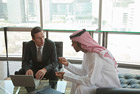 Western and middle eastern businessmen having meeting
